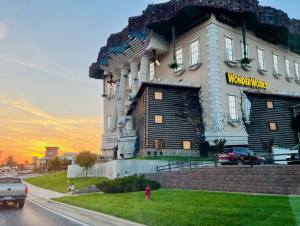 Things To Do In Branson - WonderWorks upside-down house sunset