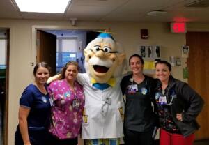 WonderWorks Myrtle Beach National Nurses Week Discount - Mascot Professor Wonder with local nurses
